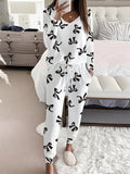 Hallie™ | Bow print V-hals lange mouwen top & tie waist broek set
