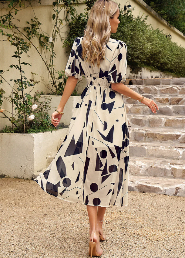Clarissa | Flattering bloemen midi jurk