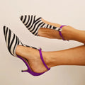 Emersyn | Low stilettos with zebra pattern and spiked toe