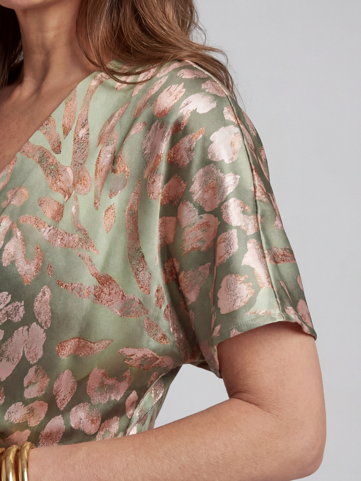 Coralie | Abstract print v neck twist waist midi jurk