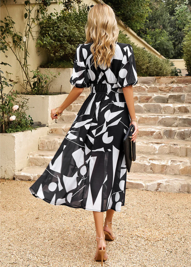 Clarissa | Flattering bloemen midi jurk