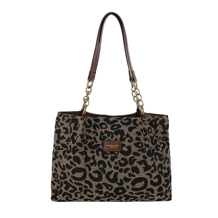 Nikita™ | Bold leopard print tote schoudertas