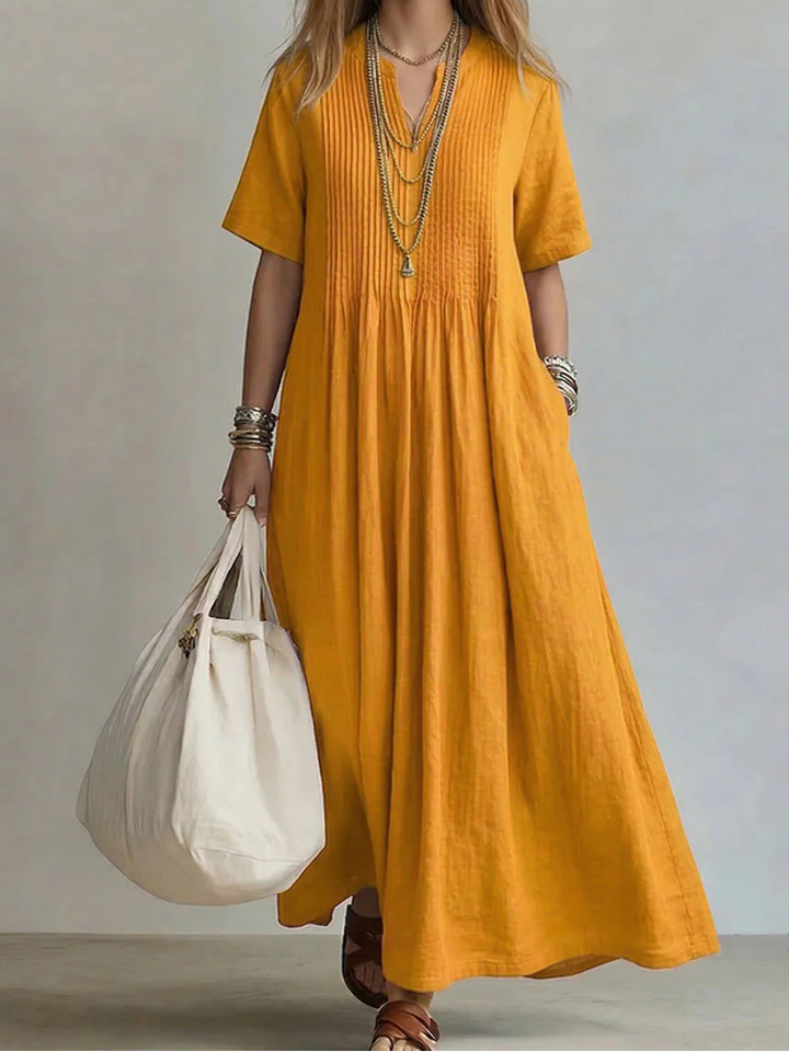 Noor | Elegante soepel vallende pleated jurk