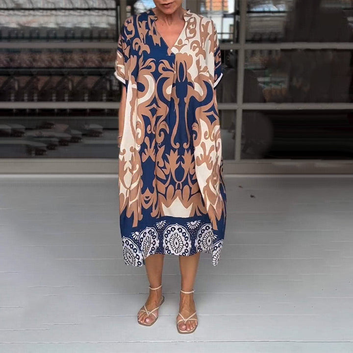 Evelora | Met print midi jurk