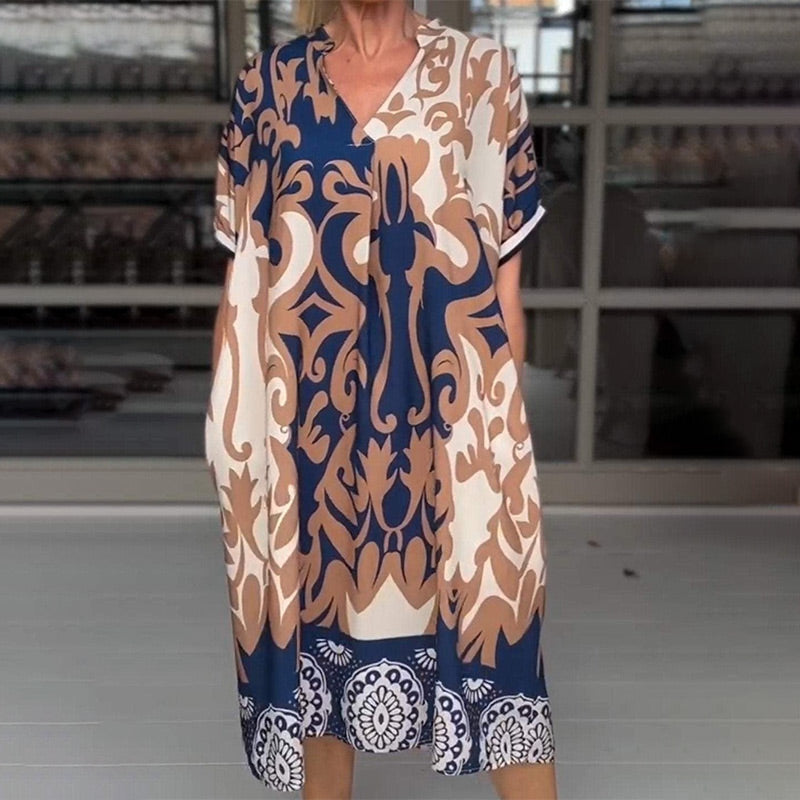 Evelora | Met print midi jurk
