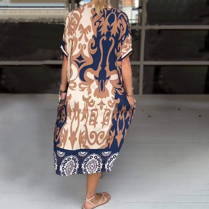 Evelora | Met print midi jurk