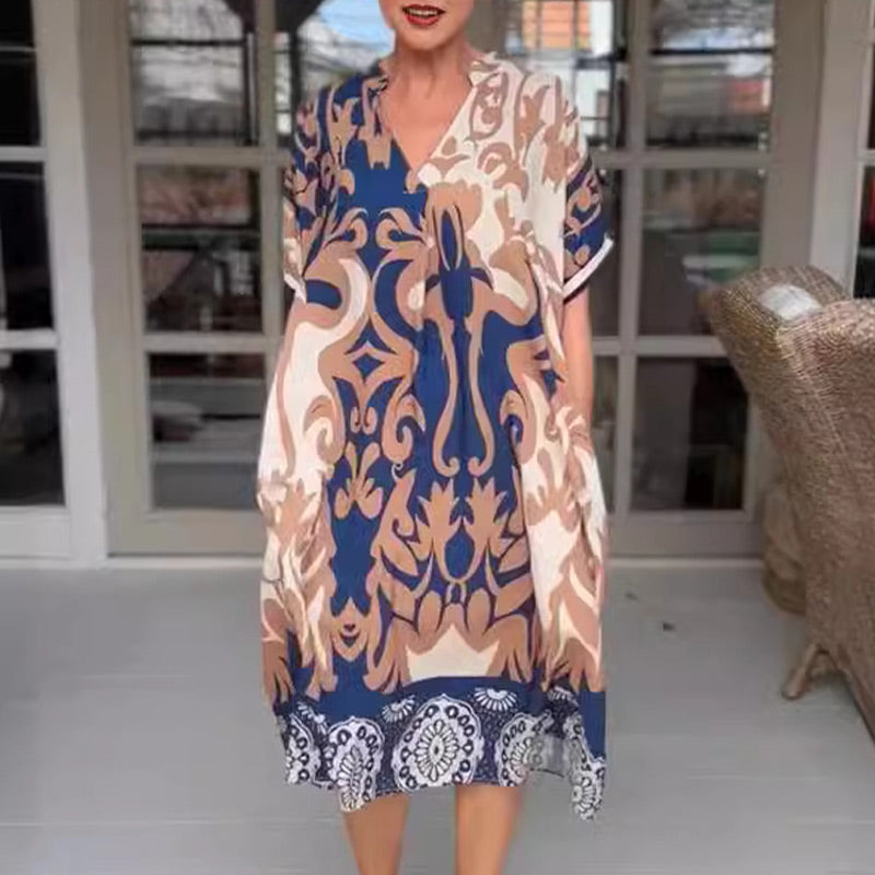 Evelora | Met print midi jurk