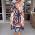 Evelora | Met print midi jurk